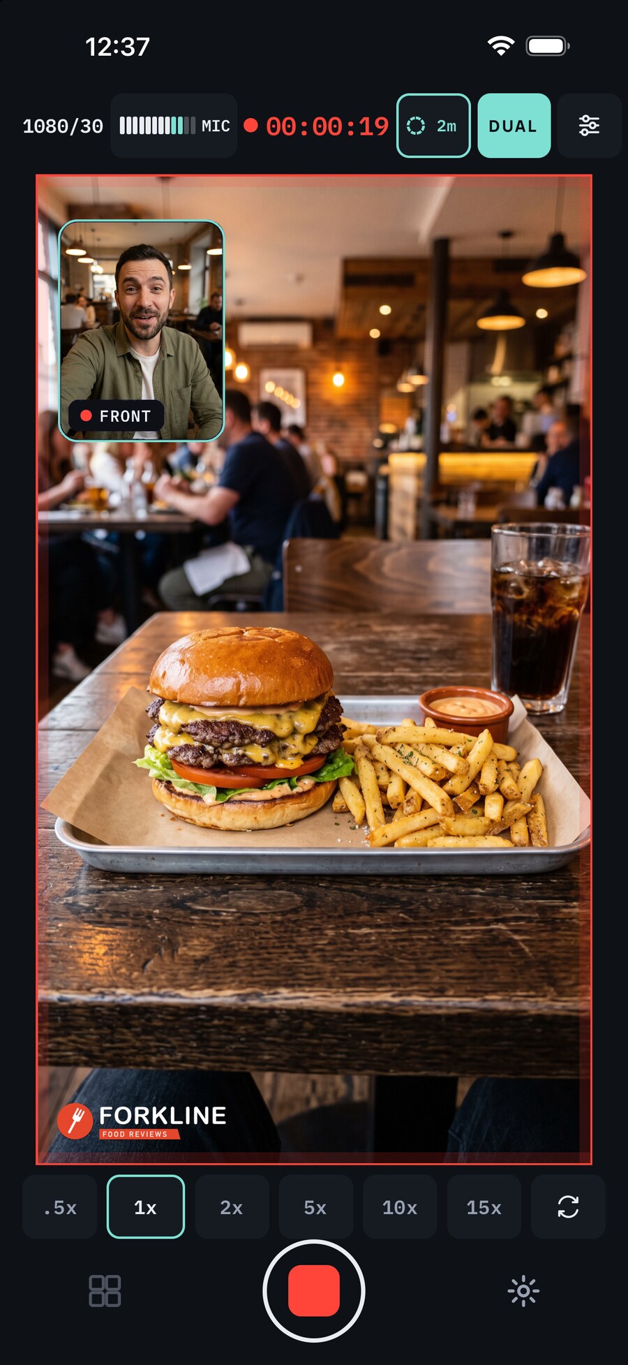 A food review filmed upright, the meal on the rear camera, the reviewer inset, and the channel logo in the corner